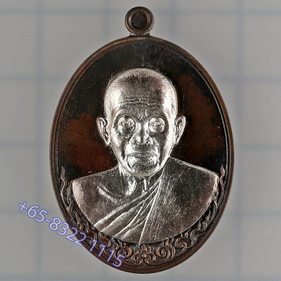 理事版做1999尊，龙婆坤自身牌，九宝铜，银面3.2cm 佛历2557